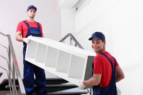 Removal team loading household items for a move in Highwycombe