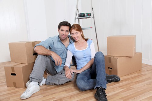 Furniture and packed boxes prepared for transport during a removal