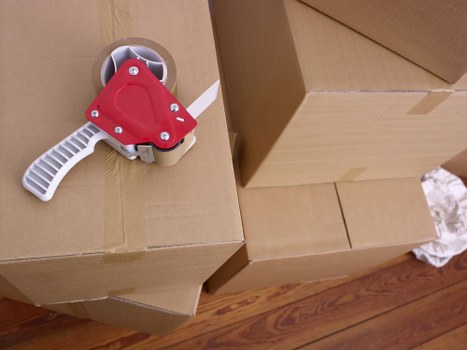 Team coordinating an office move with packing and loading steps