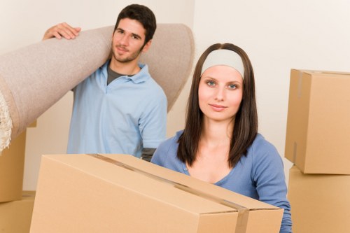 Local movers handling furniture near a High Wycombe property