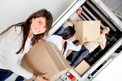 Careful packing for removals in High Wycombe with labelled boxes